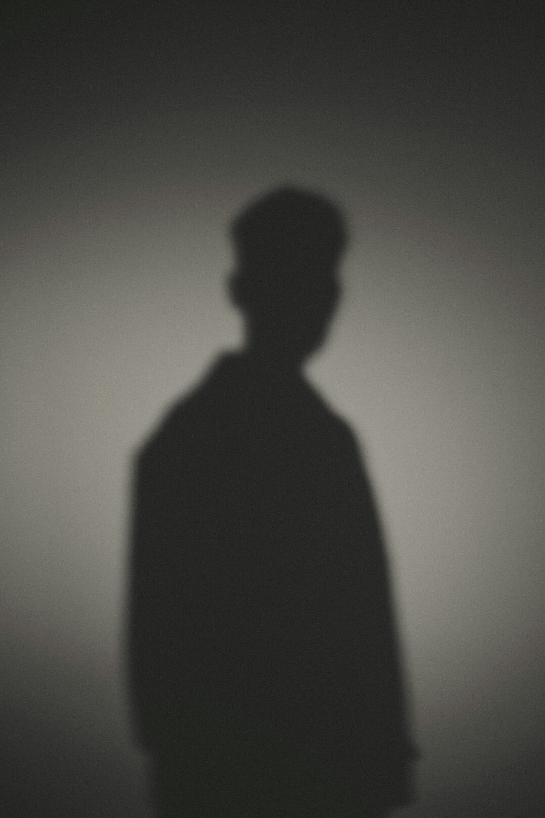 mysterious man in shadow