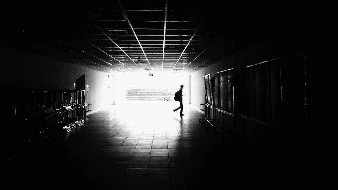 shadowy figure in hallway